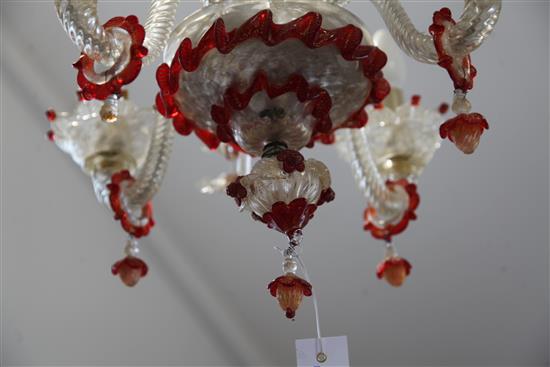 A Venetian clear and red glass four branch chandelier, c.1900, H.2ft 2in.